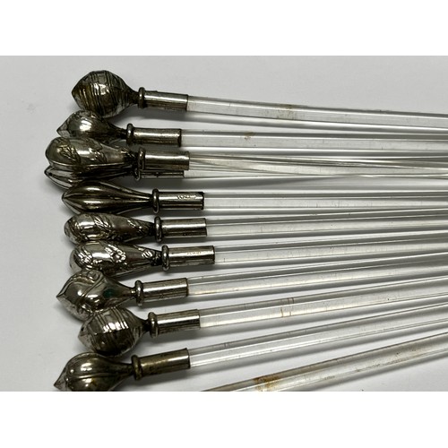 652 - 11 Silver topped cocktail stirrers