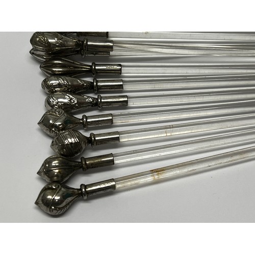 652 - 11 Silver topped cocktail stirrers