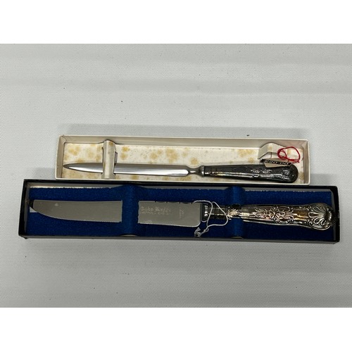 653 - Silver handled cake knife and letter opener - both boxed