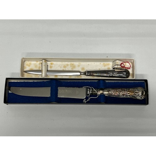 653 - Silver handled cake knife and letter opener - both boxed