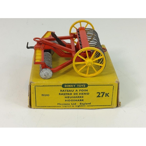 114 - 3 boxed Dinky items, 771 International Road Signs, 692 5.5 Medium Gun and 27K Hay Rack