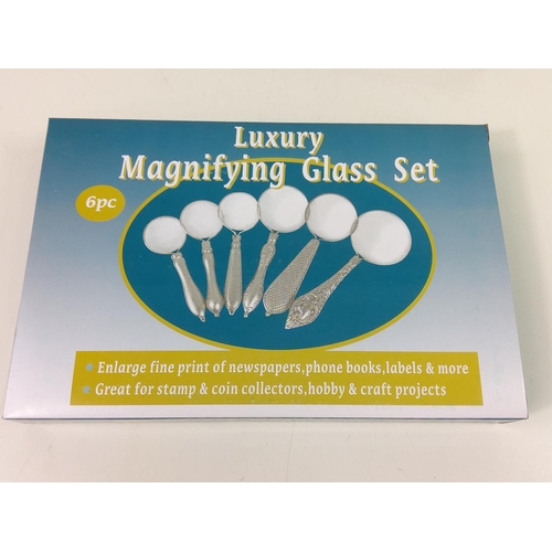 130 - Boxed set of 6 magnifying glasses