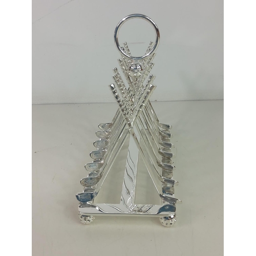 131 - Plated golfing toast rack