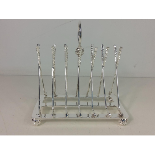 131 - Plated golfing toast rack