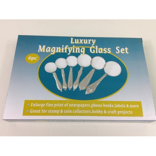 47 - Boxed set of 6 magnifying glasses