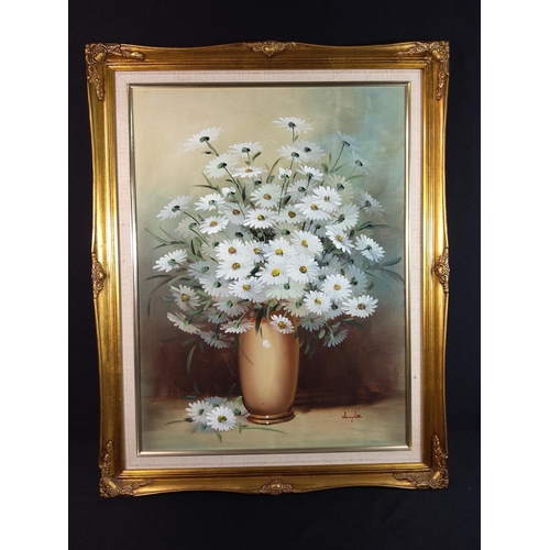 7 - Gilt framed oil on canvas of flowers signed Nancy Lee, 57cms x 72cms