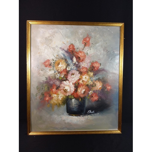 8 - Gilt framed oil on canvas of flowers signed Stempl, 67cms x 57cms