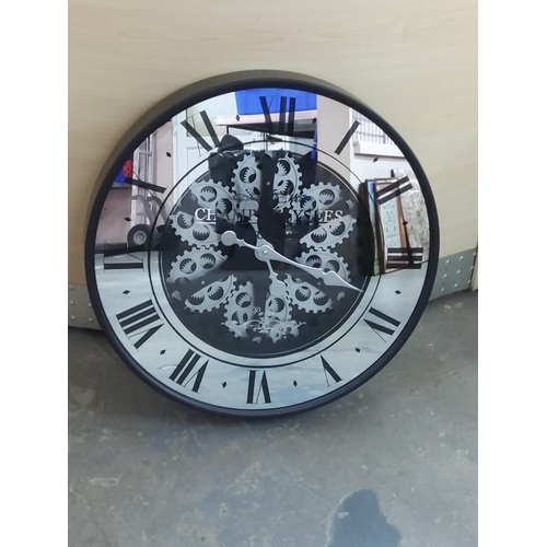 13 - Round cased clock, 60cms diameter