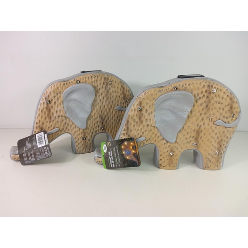 229 - 2 LED elephants, new and tagged