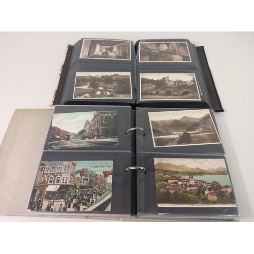 306 - 2 Albums of postcards