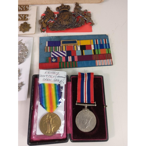 664 - Military badges, cap badges, ribbons etc