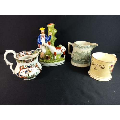 429 - Staffordshire figures, 2 jugs and a tankard