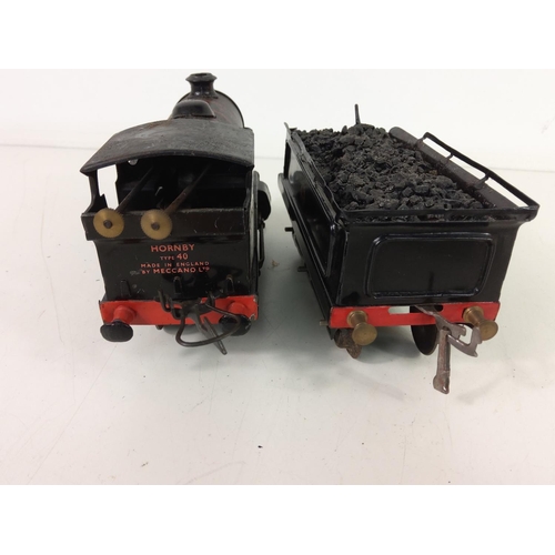 489 - 2 vintage clockwork tin plate trains, one with tender