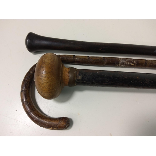 370 - 3 antique walking sticks