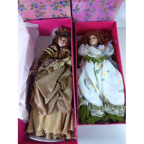 402 - 2 large boxed porcelain dolls