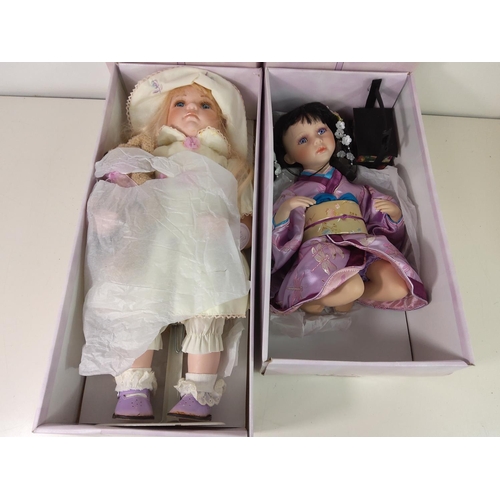 403 - 2 large boxed porcelain dolls