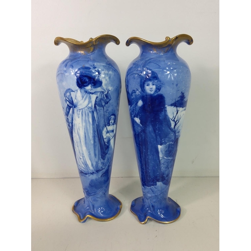 546 - Pair of Doulton blue and white art Noveau vases (one AF)