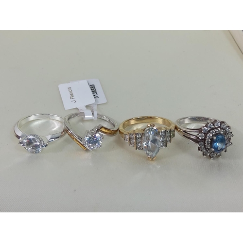 548 - 4 silver stone set rings