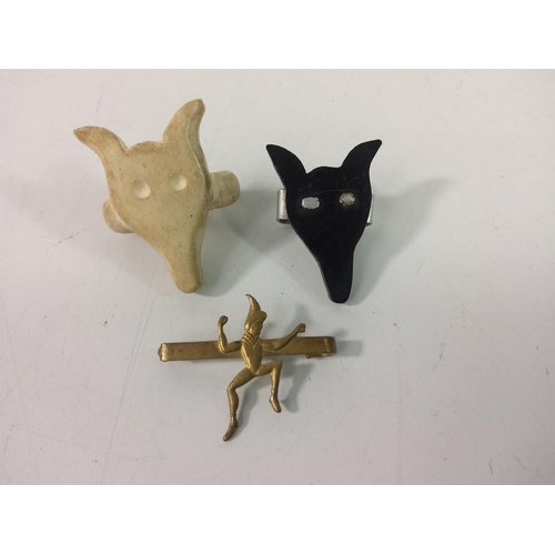 506 - 2 fox head woggles and a brooch