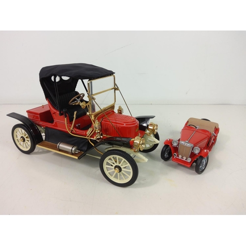 17 - 2 boxed model vehicles