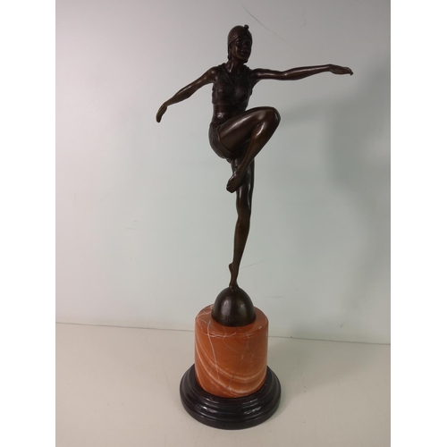 304 - Cast bronze dancing girl on marble base, height 57cms