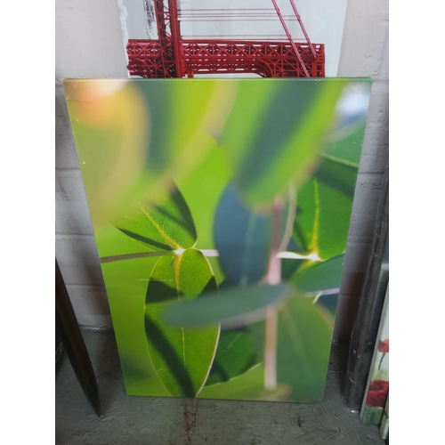 194 - 14 canvas pictures, longest 140cms