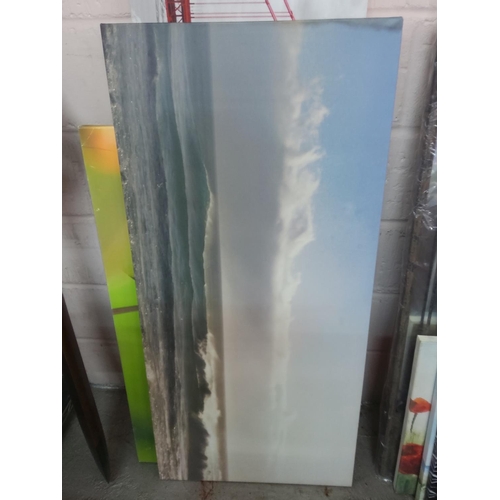 194 - 14 canvas pictures, longest 140cms