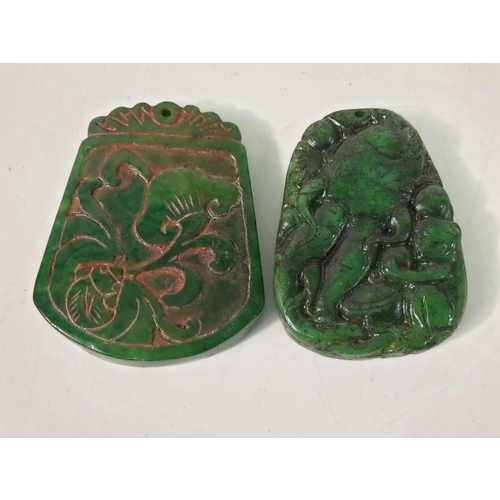 300 - 2 carved jade amulettes