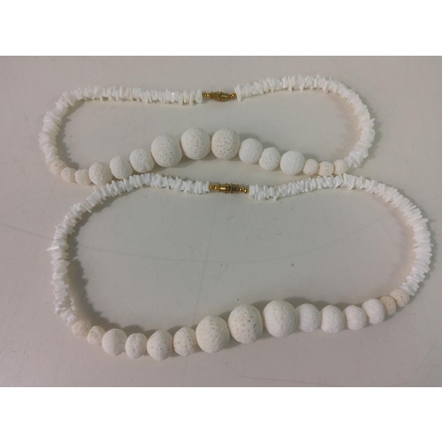 312 - 2 white coral necklces