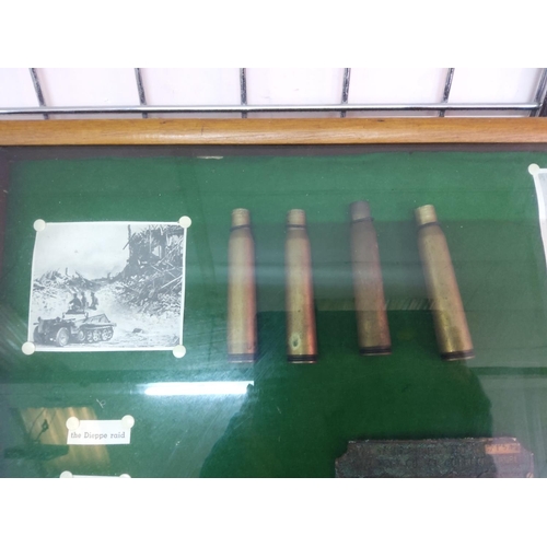 208 - Glass display case of military shell cases and other items, 61cms x 48cms