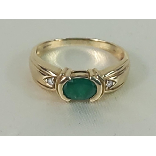 329 - 9ct gold emerald solitaire band with diamond shoulders, size P