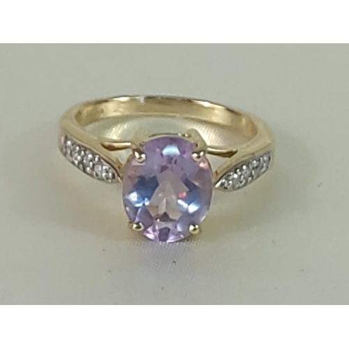 334 - 9ct gold amethyst and diamond ring, size M