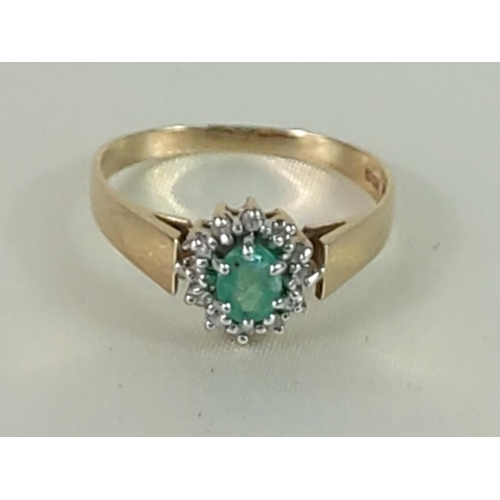 335 - 9ct gold emerald and diamond cluster ring, size P