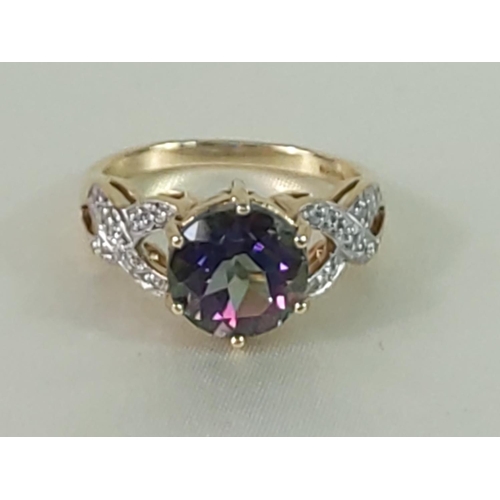 337 - 9ct gold mystic topaz and diamond ring, size N