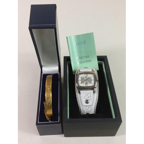 324 - Yellow metal bangle and Next watch