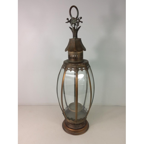 200 - Ornate metal and glass lantern, 70cms in height