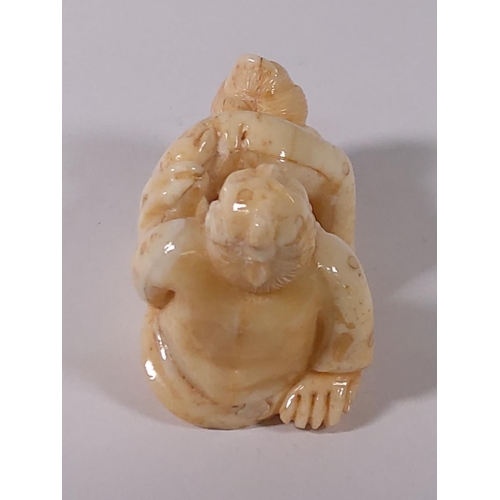 301 - Carved bone erotic sculpture