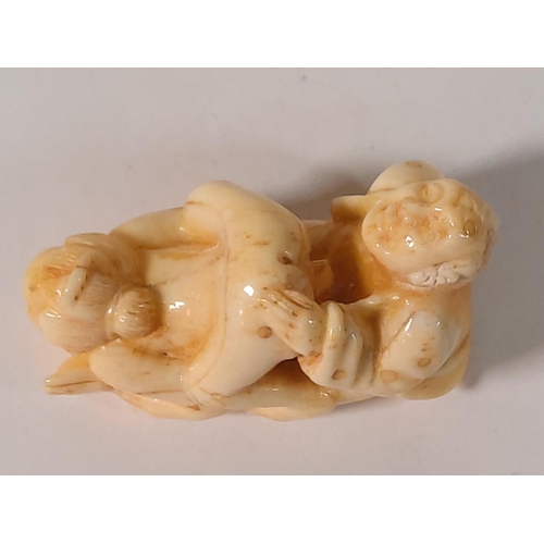 301 - Carved bone erotic sculpture