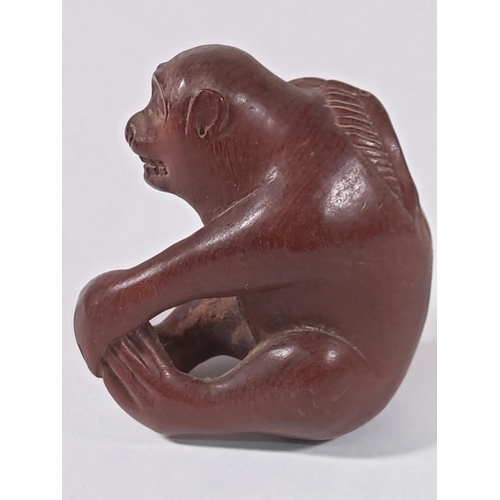 360 - Carved Oriental monkey, signed