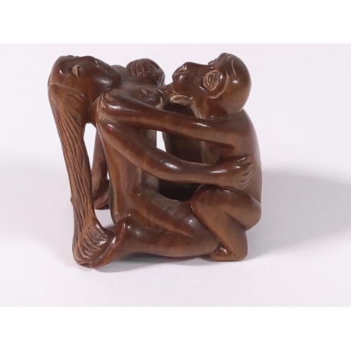 276 - Carved wood signed erotic netsuke