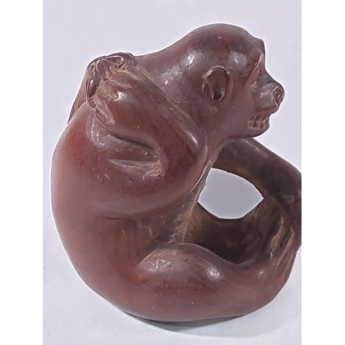 360 - Carved Oriental monkey, signed