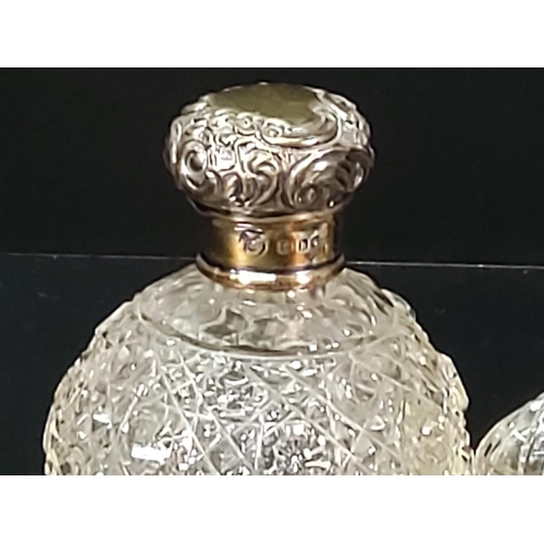 400 - Silver topped cut glass bottle and silver topped inkwell