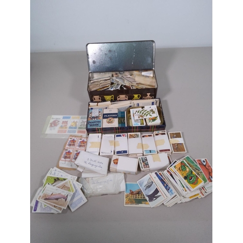 8 - Large quantity of collectors cards and albums and contents