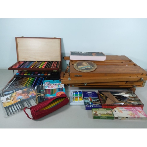 38 - Large box of art equipment, easel etc