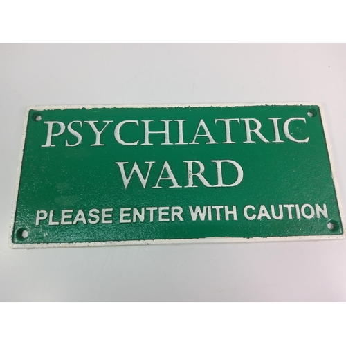 103 - Cast metal sign