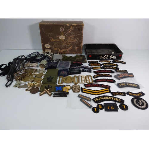 65 - Box of military badges, sew on badges and accessories