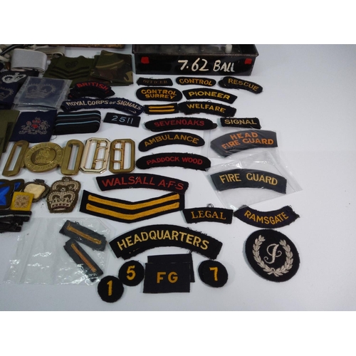 65 - Box of military badges, sew on badges and accessories