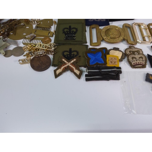 65 - Box of military badges, sew on badges and accessories