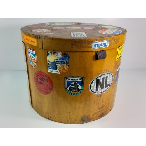 107 - Vintage 1950's bentwood drum box covered with stickers, 35cms in height x 45cms diameter