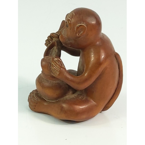 181 - Large signed carved monkey netsuke